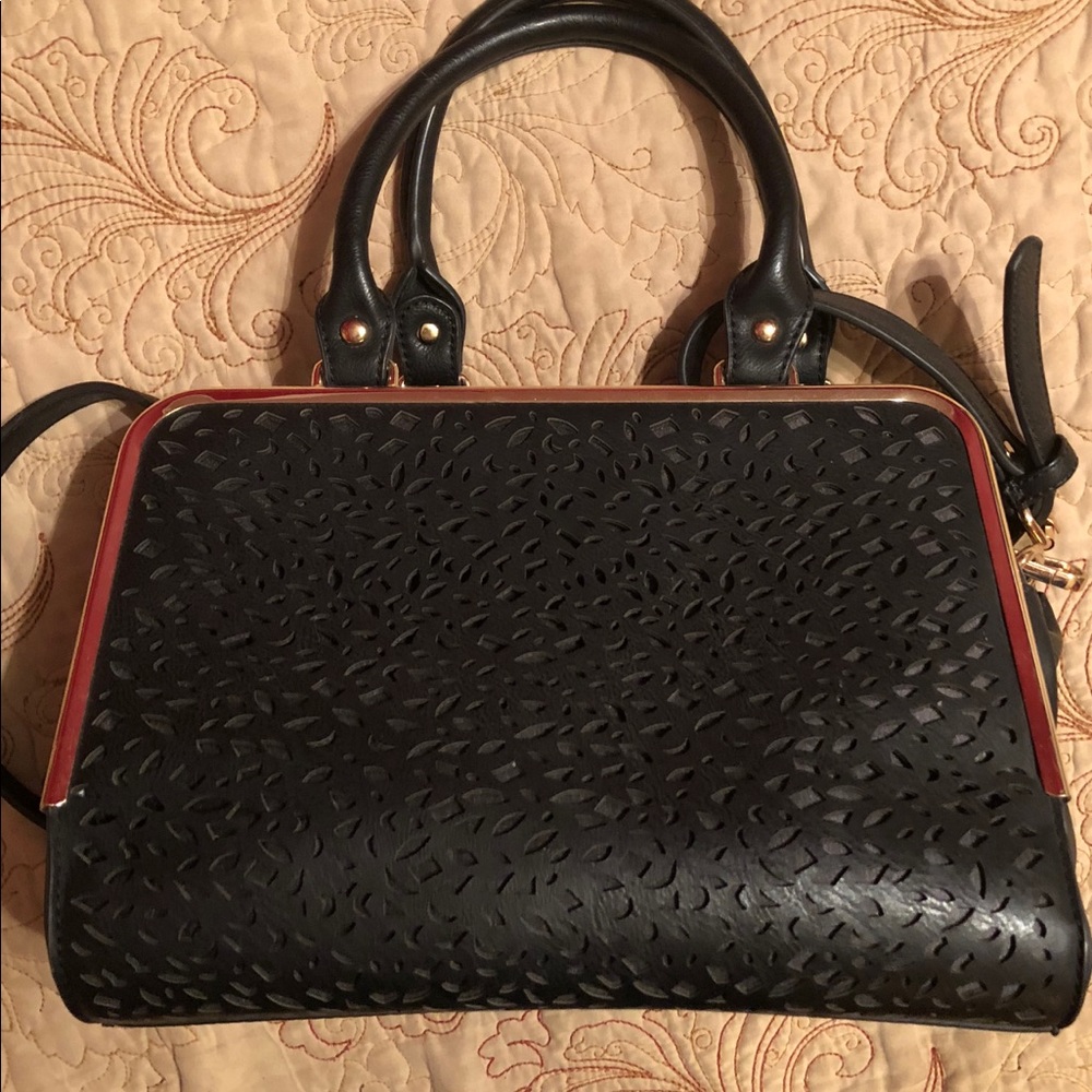 Cute black purse with cutout lacy front